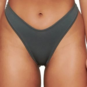 SKIMS cotton dipped thong in Deep sea